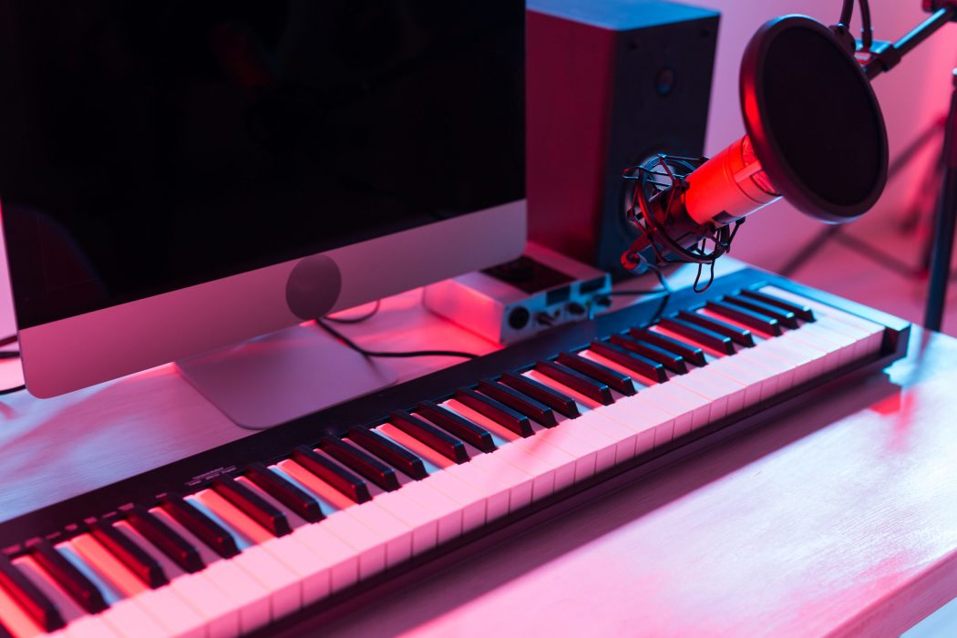 Synthesizer keyboard digital recording, home music record studio concept. Leisure and hobby.